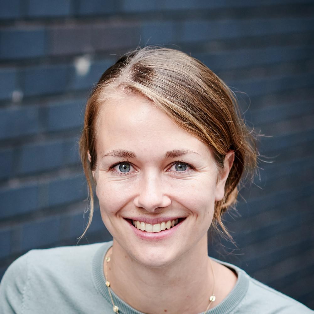 Dora Clarke, Head of Brand & External Affairs at Osprey Charging, speaking at Powered Up 2027